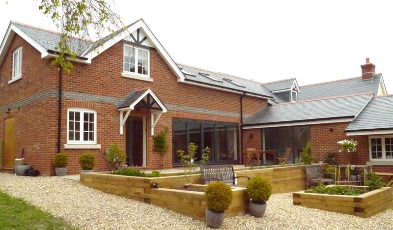 Large, modern extension to cottage